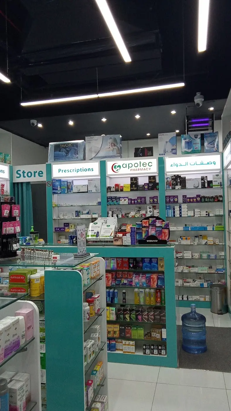 Inside Apotec Bay Pharmacy, shelves of wellness products